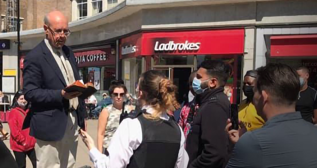 Pastor John Sherwood tries to reason with local police before being arrested for preaching on the biblical definition of marriage.