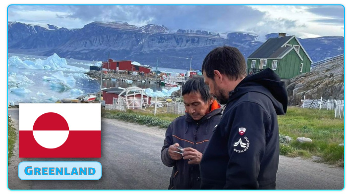 Missionary Chris Shull gives a Chick tract in Greenlandic to this man on a remote island.